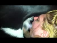 Kinky blonde sucking and pleasuring dog's hard dick